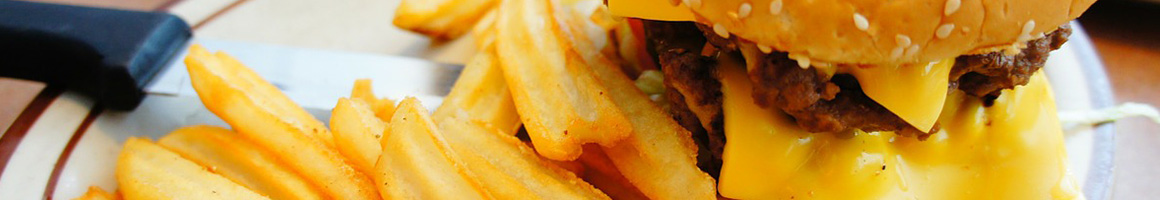 Eating Burger Fast Food Hot Dog at Rossotti’s Alpine Inn restaurant in Portola Valley, CA.